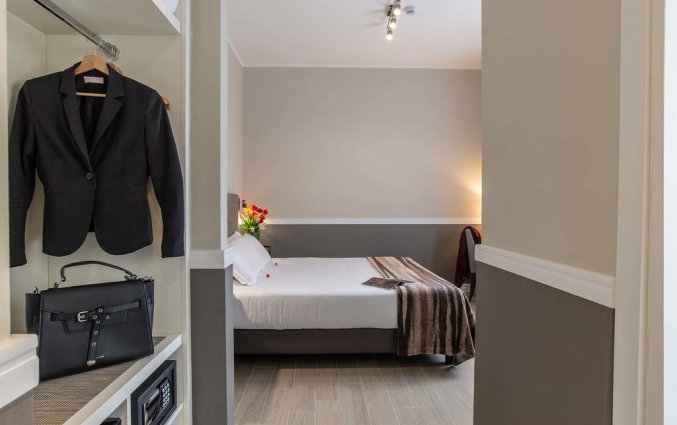 Slaapkamer van Fragrance Hotel St. Peter in Rome