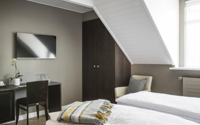 Tweepersoonskamer van Hotel Odinsve in Reykjavik op IJsland