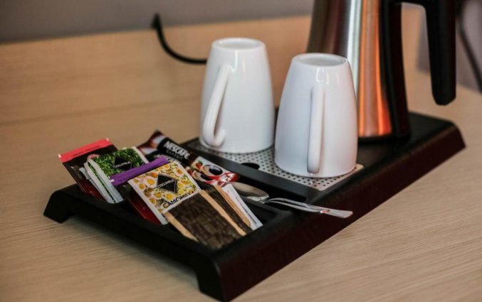 Theefaciliteiten op de kamer van Hotel Berlino Milaan