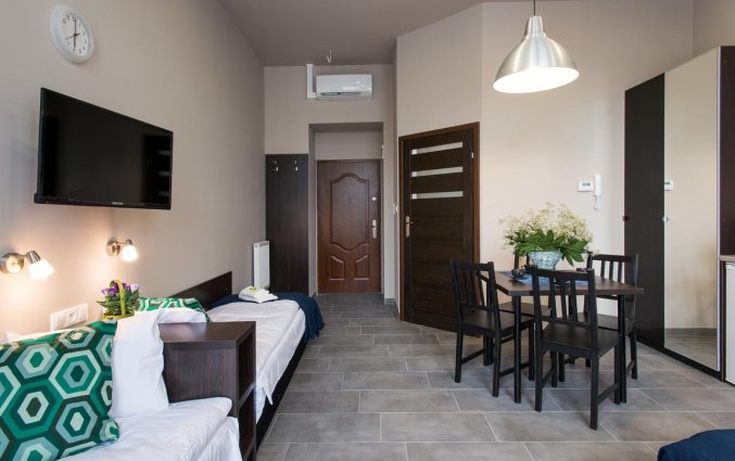 Woonkamer van een appartement van appartementen Happy Tower Krakow in Krakau