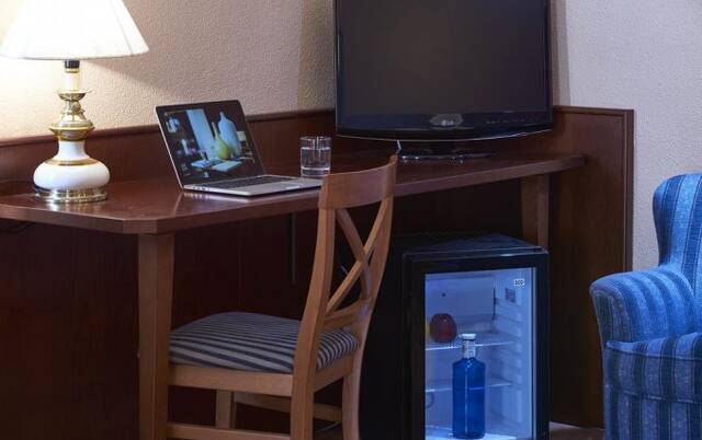 Slaapkamer van hotel Casón Del Tormes in Madrid