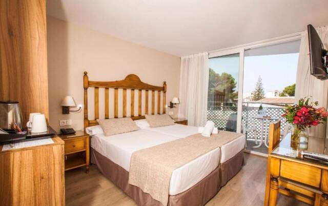 Slaapkamer van hotel Villa Flamenca in Nerja