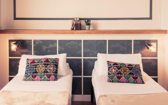 Slaapkamer van hotel Casa Gracia in Barcelona