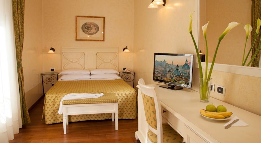 Slaapkamer van hotel Piemonte in Rome