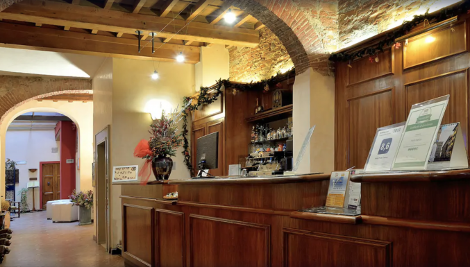 Receptie in hotel Porta Faenza