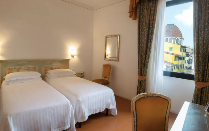 Slaapkamer in Hotel Machiavelli Palace