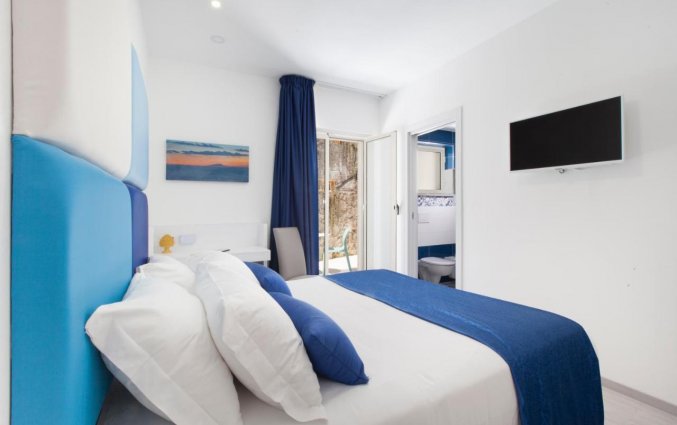 Slaapkamer bij Hotel O Sole Mio
