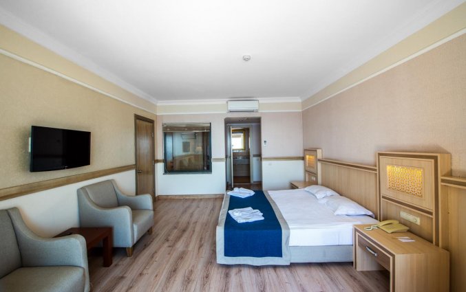 Slaapkamer van Hotel Utopia World in Alanya
