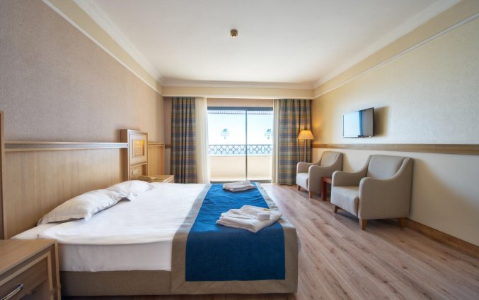 Slaapkamer van Hotel Utopia World in Alanya