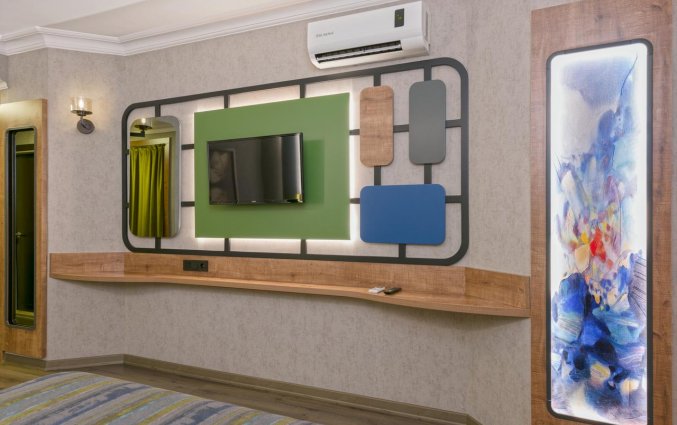 Slaapkamer van Hotel Monart City in Alanya