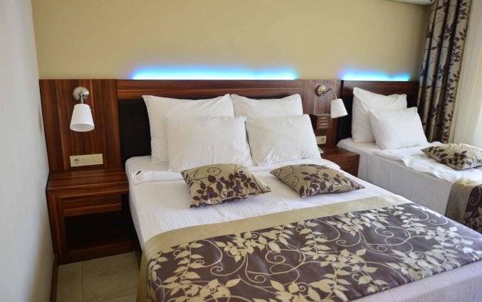 Slaapkamer van Hotel Kandelor in Alanya