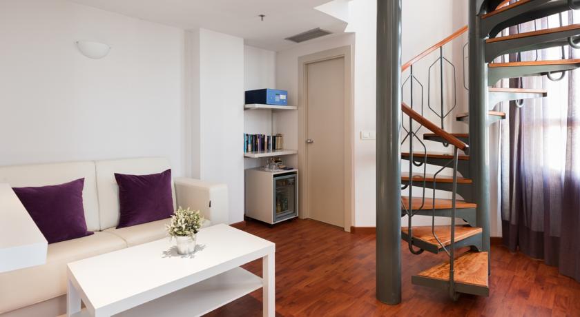 Slaapkamer van hotel NH las Artes in Valencia