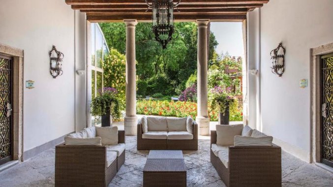 Zithoek van NH Collection Grand Hotel Dei Dogi Venetië