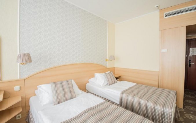 Slaapkamer in Hotel Orion Varkert Budapest