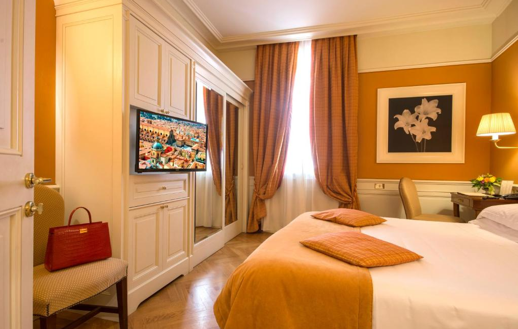 Kamer van Hotel Corona d Oro in Bologna