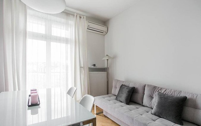 Eet- en zithoek van een appartement van Appartementen 4Seasons in Krakau