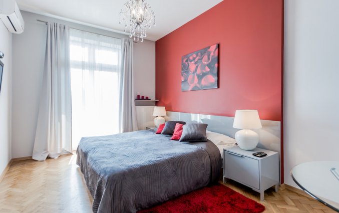 Slaapkamer van een appartement van Appartementen 4Seasons in Krakau