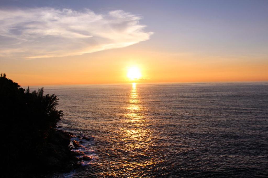 Zonsondergang bij Ayara Kamala Resort & Spa