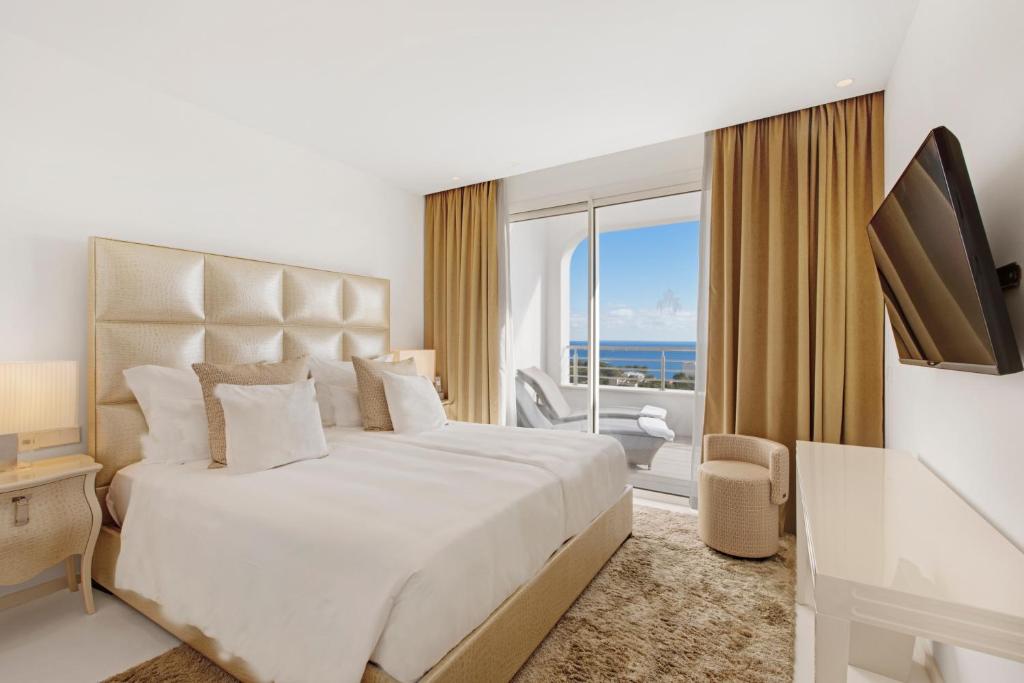 Portals Hills Boutique Hotel - slaapkamer met zeezicht