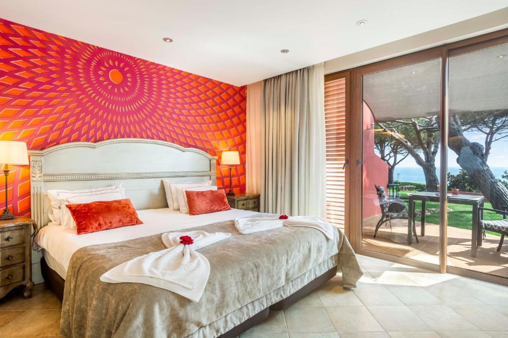 Boutique Hotel Miranda - slaapkamer met balkon en zeezicht