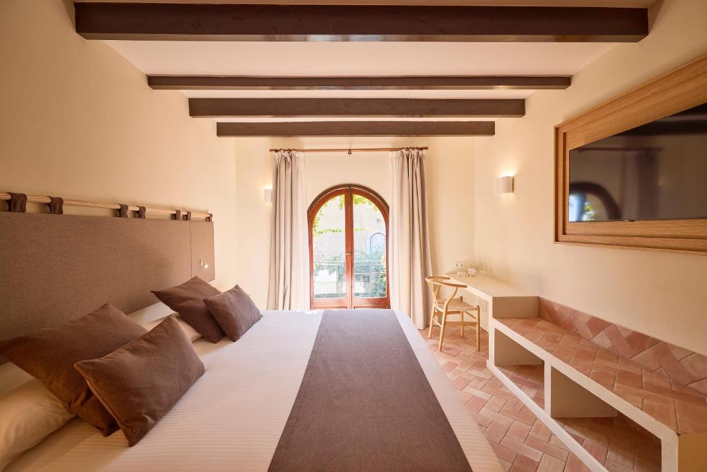 Petit Hotel Ses Rotges - kamer met zithoek