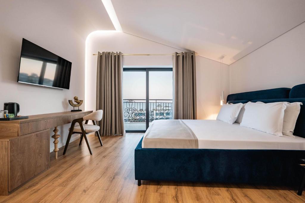 Mae Select Hotel - slaapkamer met balkon