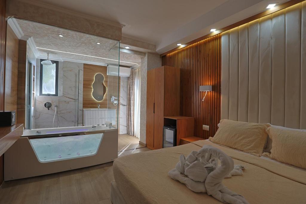 Ilio Boutique Hotel - slaapkamer met bubbelbad