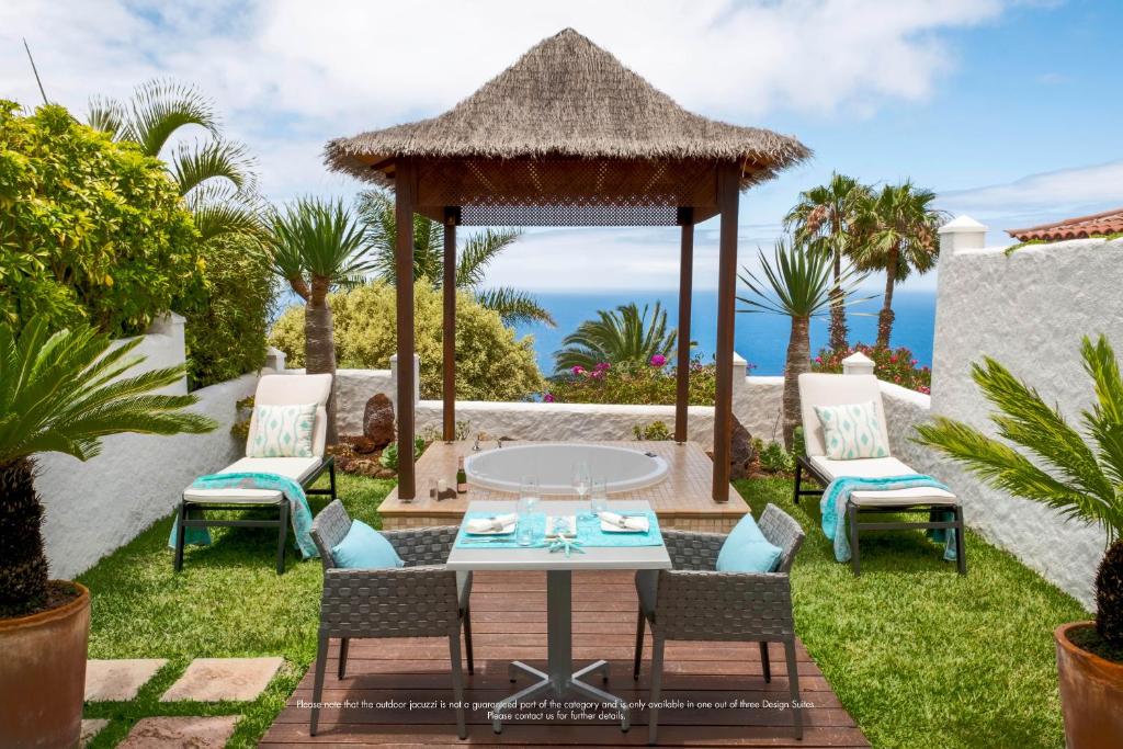 Hotel Jardin de la Paz - loungehoek onder de palapa