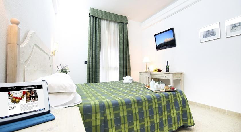 Tweepersoonskamer van Hotel Pausania Inn op Sardinie
