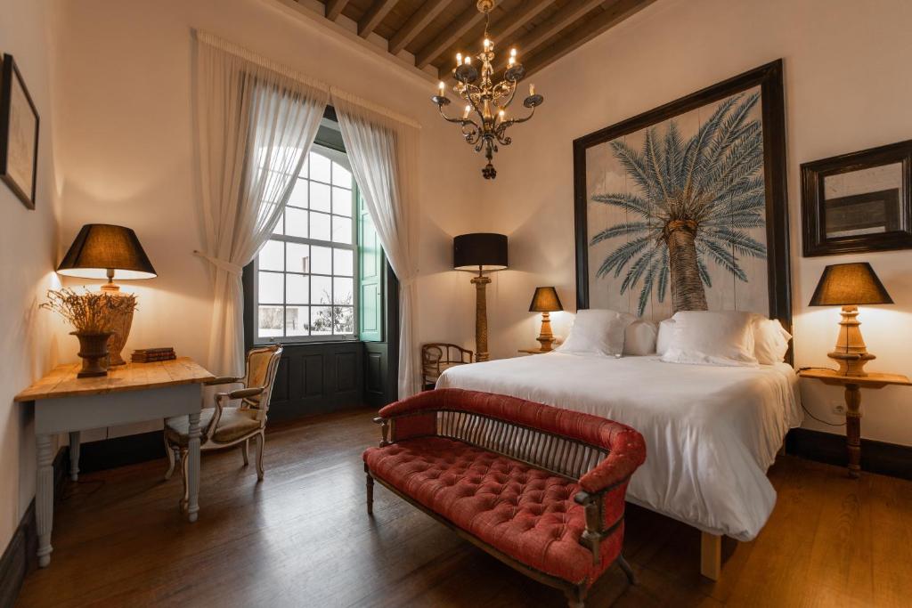 La Casa de los Naranjos - slaapkamer met zithoek