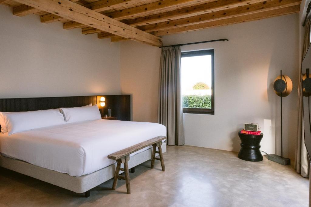 Casa Maca - slaapkamer met balkenplafond