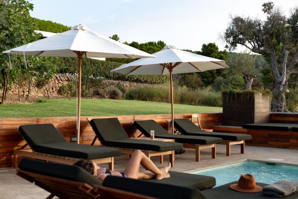 Casa Maca - zwembad met parasols