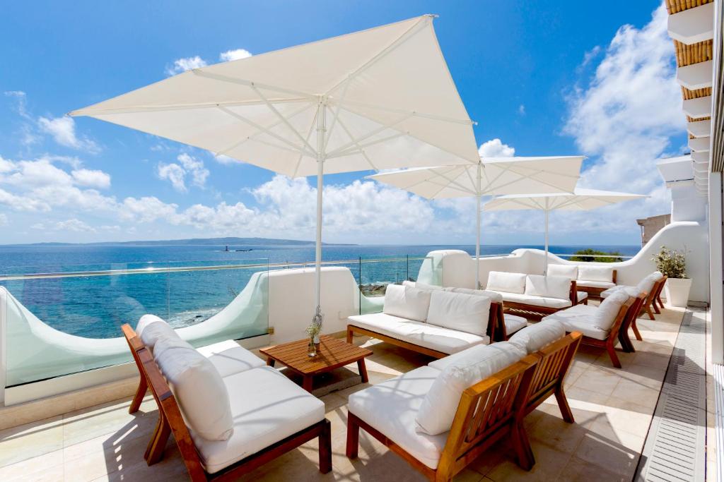 Relais La Ghinghetta - terras met zeezicht