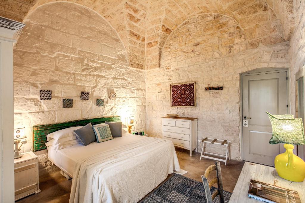 Masseria Cervarolo - kamer met natuurstenen wand