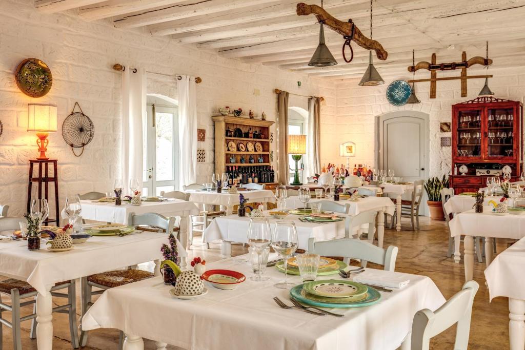 Masseria Cervarolo - restaurant met gedekte tafels