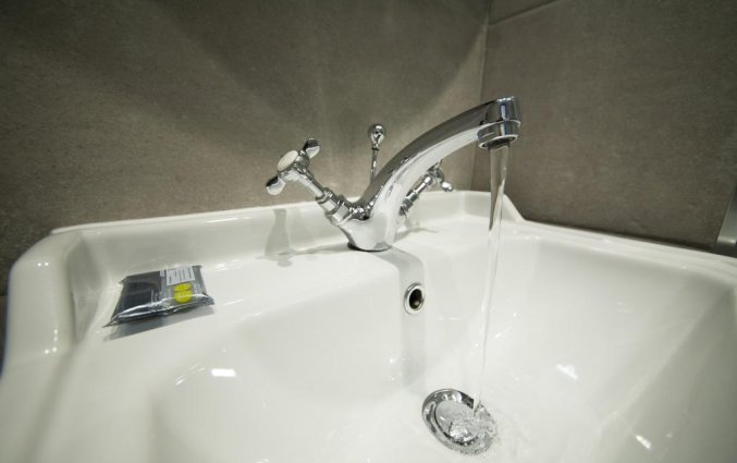 Badkamer van een tweepersoonskamer van Hotel House of Toby in Londen